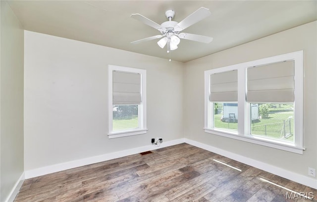 900 3rd St, Troy, MO 63379 - spare room featuring wood finished floors and ceiling fan
