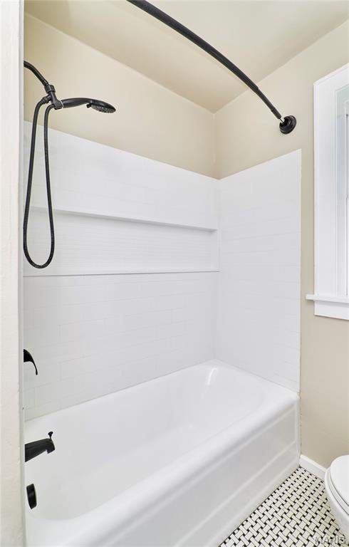 900 3rd St, Troy, MO 63379 - bathroom with toilet and shower / bathtub combination