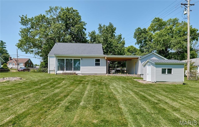 900 3rd St, Troy, MO 63379 - rear view of house with a storage unit and roof with shingles