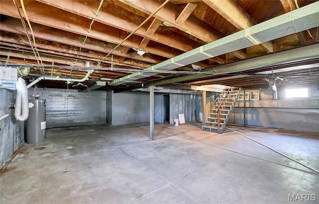 900 3rd St, Troy, MO 63379 - basement featuring water heater and stairway