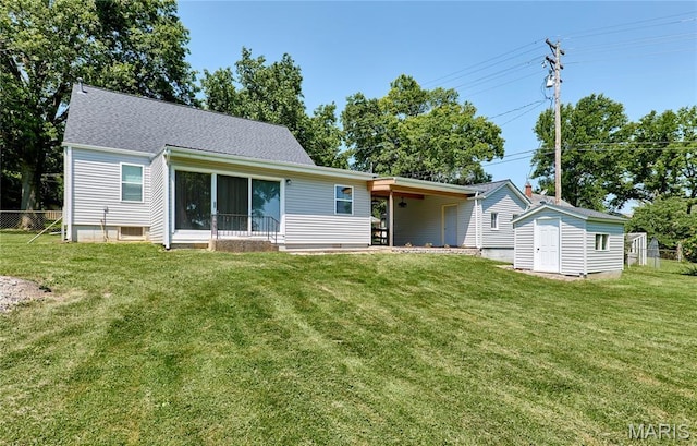 900 3rd St, Troy, MO 63379 - rear view of property featuring a shed and a shingled roof