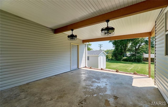 900 3rd St, Troy, MO 63379 - view of patio featuring a storage shed