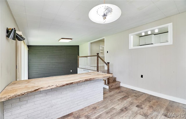 900 3rd St, Troy, MO 63379 - kitchen featuring wood finished floors and baseboards