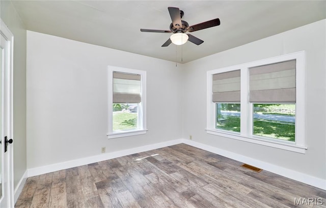 900 3rd St, Troy, MO 63379 - unfurnished room featuring wood finished floors and a ceiling fan
