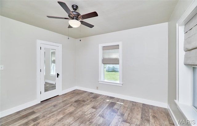 900 3rd St, Troy, MO 63379 - empty room with wood finished floors and ceiling fan