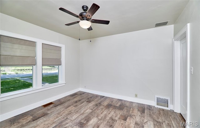 900 3rd St, Troy, MO 63379 - unfurnished room with wood finished floors and a ceiling fan