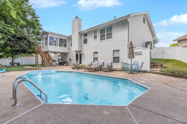 7 Mcclay Village Cir, Saint Peters, MO 63376 - view of pool with a patio, a fenced backyard, an outdoor hangout area, stairs, and a gate