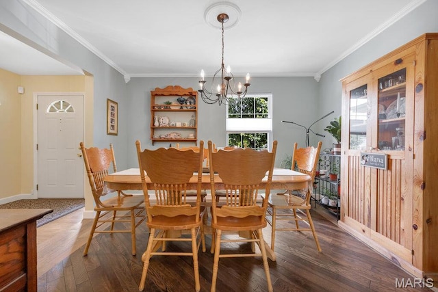 7 Mcclay Village Cir, Saint Peters, MO 63376 - dining area featuring healthy amount of natural light, wood finished floors, crown molding, and a chandelier