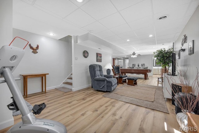 7 Mcclay Village Cir, Saint Peters, MO 63376 - workout room with light wood-style floors, ceiling fan, recessed lighting, and a paneled ceiling