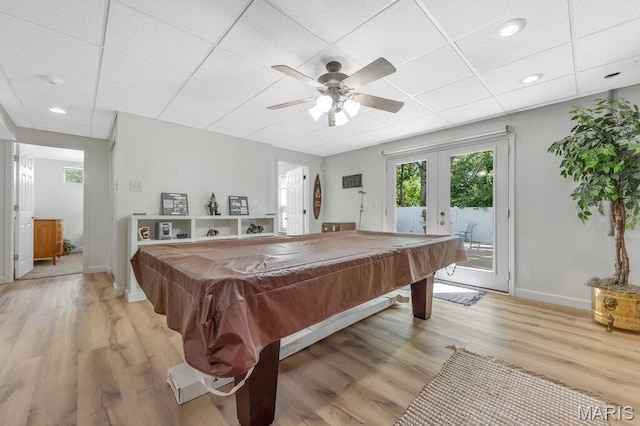 7 Mcclay Village Cir, Saint Peters, MO 63376 - game room with a drop ceiling, french doors, light wood-type flooring, a ceiling fan, and billiards