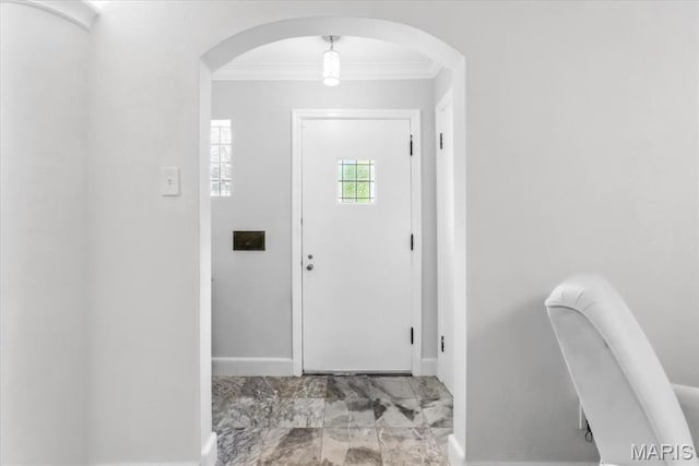 7248 Dorset Ave, University City, MO 63130 - foyer entrance with arched walkways, crown molding, and marble look tiles
