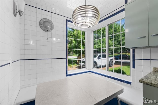 7248 Dorset Ave, University City, MO 63130 - unfurnished dining area with a chandelier