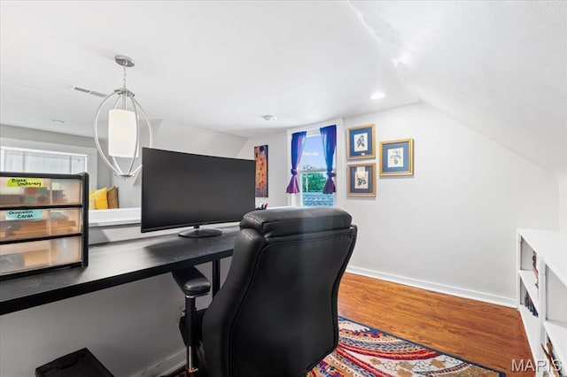 7248 Dorset Ave, University City, MO 63130 - home office featuring lofted ceiling, wood finished floors, and plenty of natural light