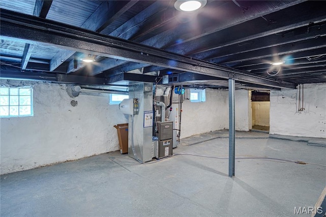 6557 Marmaduke Ave, Saint Louis, MO 63139 - below grade area featuring heating unit and plenty of natural light