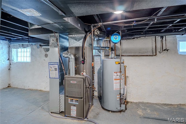 6557 Marmaduke Ave, Saint Louis, MO 63139 - utilities featuring water heater and heating unit