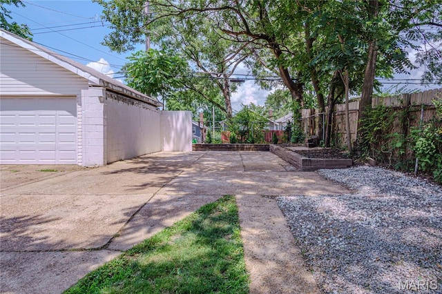 6557 Marmaduke Ave, Saint Louis, MO 63139 - view of yard featuring driveway