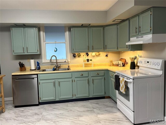 325 N Prairie St, Greenville, IL 62246 - kitchen with stainless steel dishwasher, electric range, under cabinet range hood, and light countertops