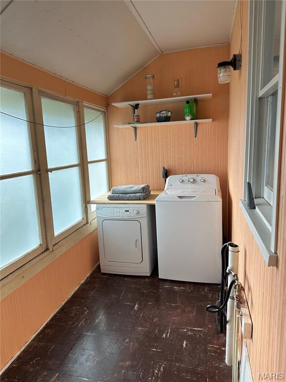 325 N Prairie St, Greenville, IL 62246 - washroom featuring washer and clothes dryer and wooden walls