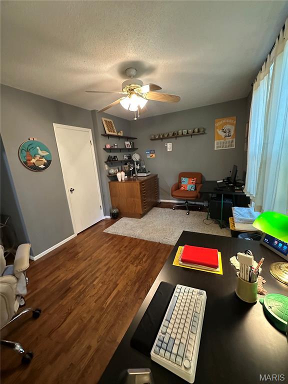 325 N Prairie St, Greenville, IL 62246 - office featuring a ceiling fan, wood finished floors, and a textured ceiling