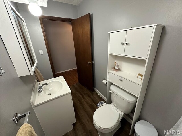 325 N Prairie St, Greenville, IL 62246 - half bath with vanity and wood finished floors