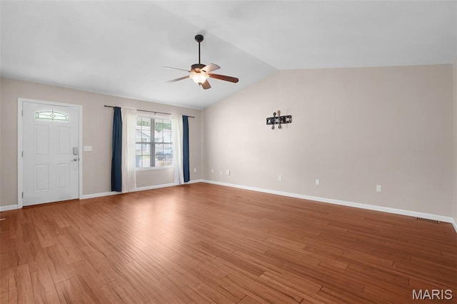 1222 W 8th St, Washington, MO 63090 - unfurnished living room featuring ceiling fan, lofted ceiling, and light wood finished floors
