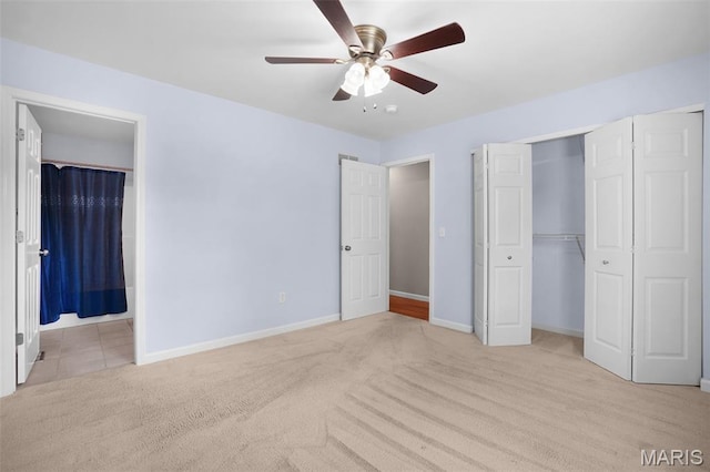 1222 W 8th St, Washington, MO 63090 - unfurnished bedroom with carpet, a closet, ensuite bath, and a ceiling fan