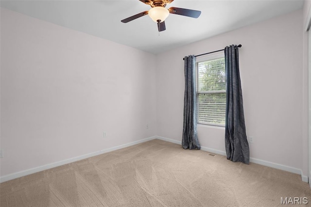 1222 W 8th St, Washington, MO 63090 - spare room featuring light colored carpet and ceiling fan