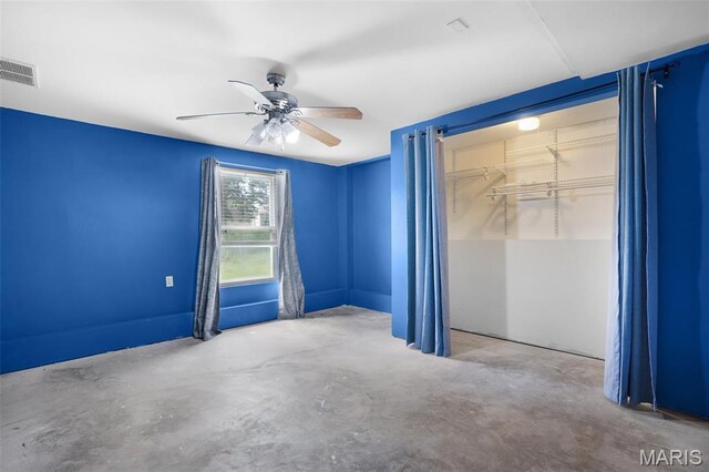 1222 W 8th St, Washington, MO 63090 - empty room featuring a ceiling fan and unfinished concrete flooring