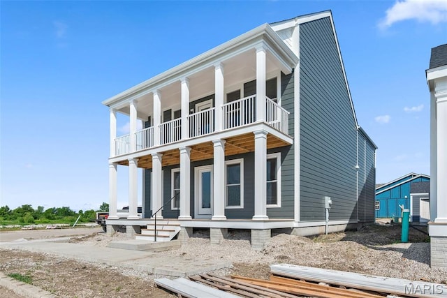 2921 Memphis St, Saint Charles, MO 63301 - neoclassical / greek revival house featuring a balcony and a porch