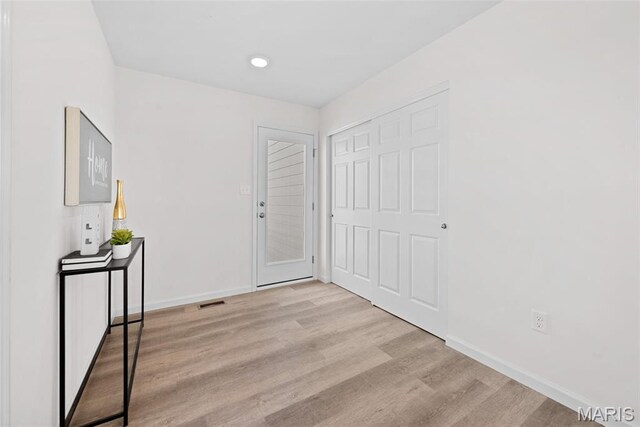 2921 Memphis St, Saint Charles, MO 63301 - entrance foyer with baseboards and wood finished floors