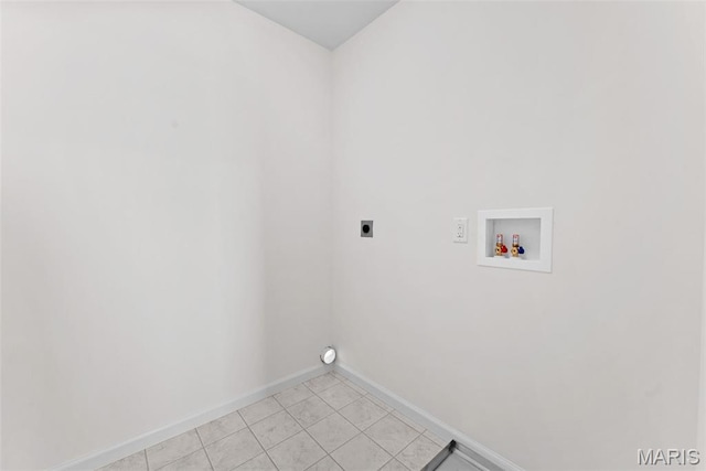 2921 Memphis St, Saint Charles, MO 63301 - laundry room featuring electric dryer hookup, hookup for a washing machine, and light tile patterned flooring