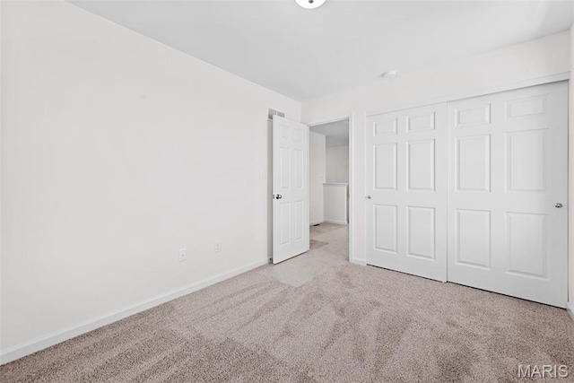 2921 Memphis St, Saint Charles, MO 63301 - unfurnished bedroom featuring carpet flooring and a closet