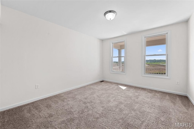 2921 Memphis St, Saint Charles, MO 63301 - empty room with carpet flooring and baseboards