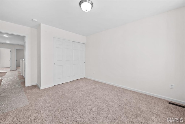 2921 Memphis St, Saint Charles, MO 63301 - unfurnished bedroom with carpet floors and a closet