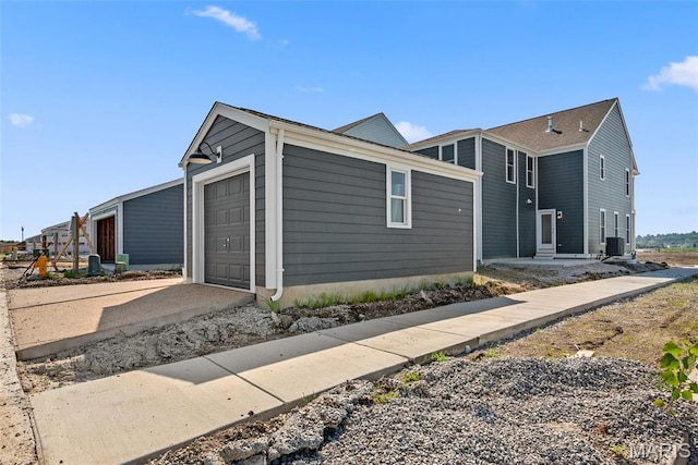 2921 Memphis St, Saint Charles, MO 63301 - view of front of property featuring an attached garage and concrete driveway