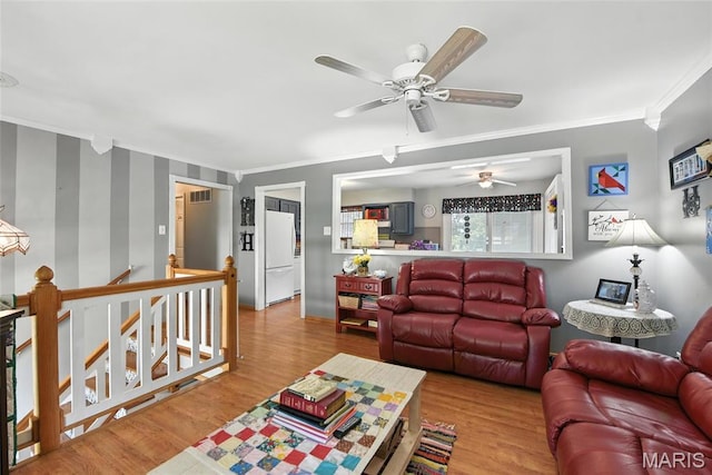 1918 Lone Pine Dr, Arnold, MO 63010 - living room with ornamental molding, a ceiling fan, and wood finished floors