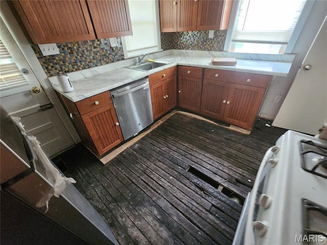 3309 Calvert Ave, Breckenridge Hills, MO 63114 - kitchen with dishwasher, backsplash, dark wood-type flooring, and light countertops