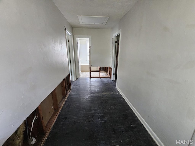3309 Calvert Ave, Breckenridge Hills, MO 63114 - corridor with attic access and dark wood finished floors