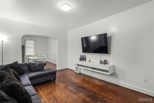 125 N 41st St, Belleville, IL 62226 - living area featuring arched walkways and wood finished floors