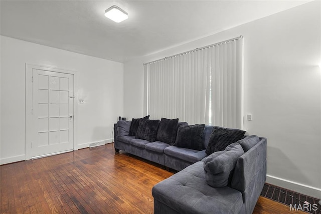 125 N 41st St, Belleville, IL 62226 - living area featuring baseboards and dark wood-style flooring