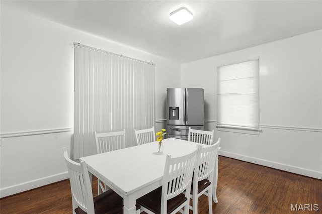 125 N 41st St, Belleville, IL 62226 - dining area with baseboards and dark wood finished floors
