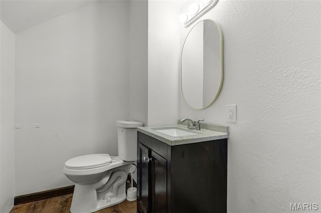 125 N 41st St, Belleville, IL 62226 - bathroom featuring wood finished floors and vanity