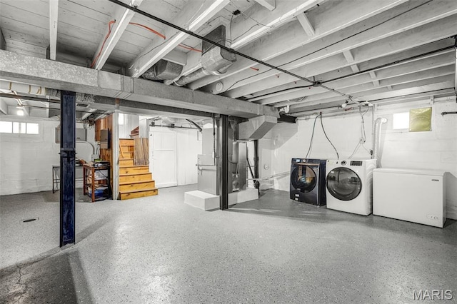125 N 41st St, Belleville, IL 62226 - basement featuring washer and clothes dryer, stairway, refrigerator, and heating unit