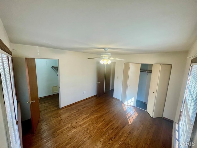 76 Cheshire Dr, Belleville, IL 62223 - unfurnished bedroom with a closet, wood finished floors, and ceiling fan