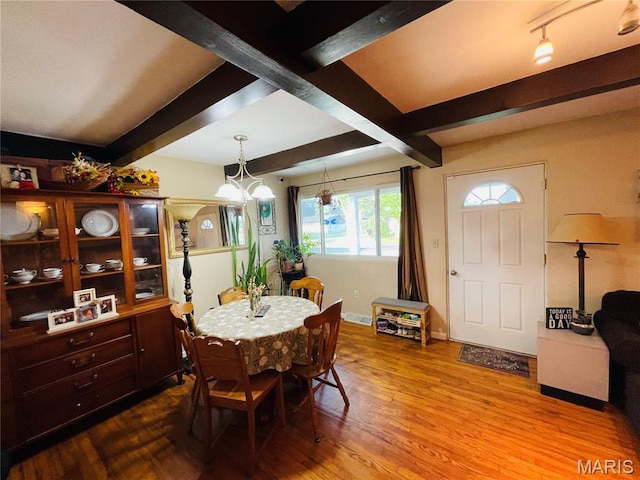 15315 Humbert Rd, Brighton, IL 62012 - dining area featuring beamed ceiling and wood finished floors