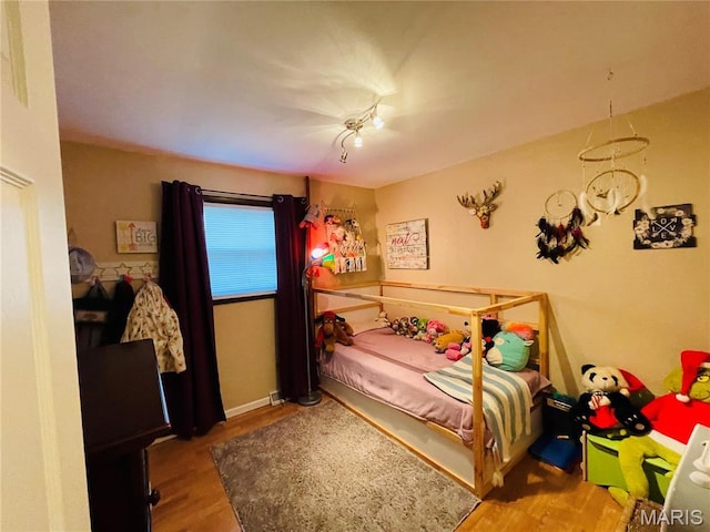 15315 Humbert Rd, Brighton, IL 62012 - bedroom featuring wood finished floors and baseboards