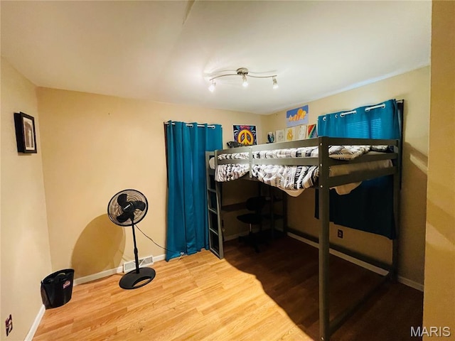 15315 Humbert Rd, Brighton, IL 62012 - bedroom featuring wood finished floors and baseboards
