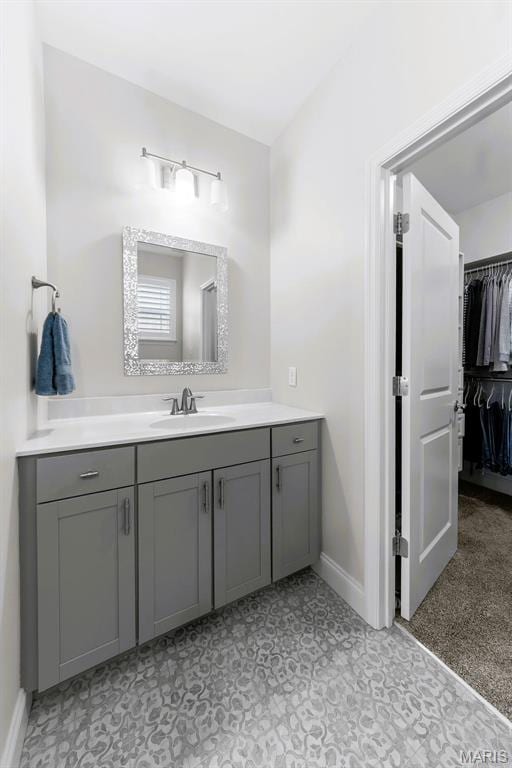 2393 Windswept Farms Dr, Eureka, MO 63025 - bathroom with vanity and a spacious closet