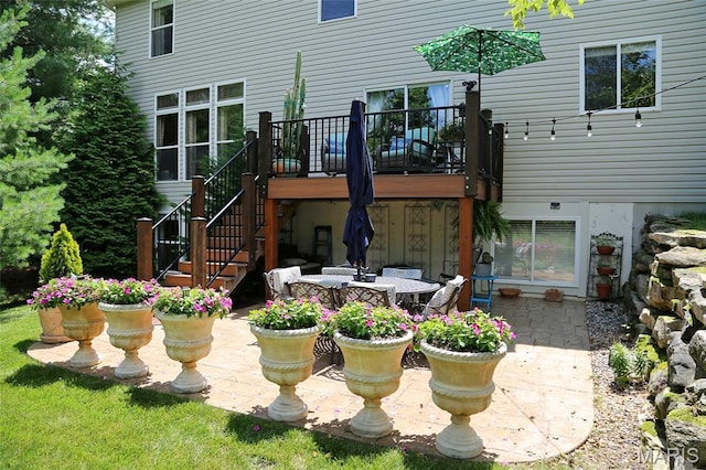 27 Carlton Lake Ct, Wentzville, MO 63385 - back of house featuring a patio, stairway, and a wooden deck
