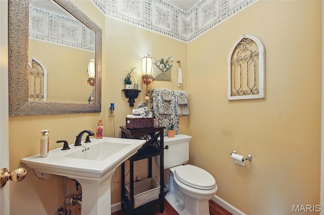 27 Carlton Lake Ct, Wentzville, MO 63385 - half bathroom with toilet and wood finished floors